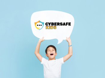 speech-bubble Cyber Safe Kids Ireland logo held by a child